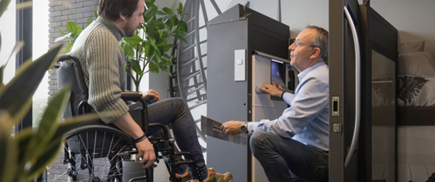 Cibes Wheelchair Lift Two Men Consulting