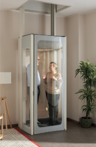 Two People In Uplift Elevator